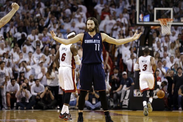 Charlotte Bobcats' Josh McRoberts (11) reacts after being called with a foul during the closing seconds in Game 2 of an opening-round NBA basketball playoff series against the Miami Heat, Wednesday, April 23, 2014, in Miami. The Heat defeated the Bobcats 101-97. (AP Photo/Lynne Sladky)