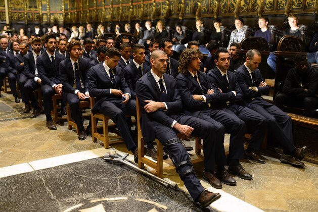 FC Barcelona's players during a religious ceremony at Barcelona Cathedral for the late former FC Barcelona's coach Tito Vilanova in Barcelona, Spain, Monday, April 28, 2014. FC Barcelona announced on their web page Friday April 25, 2014, that Vilanova has died Friday following a long battle with throat cancer. He was 45. (AP Photo/Manu Fernandez)