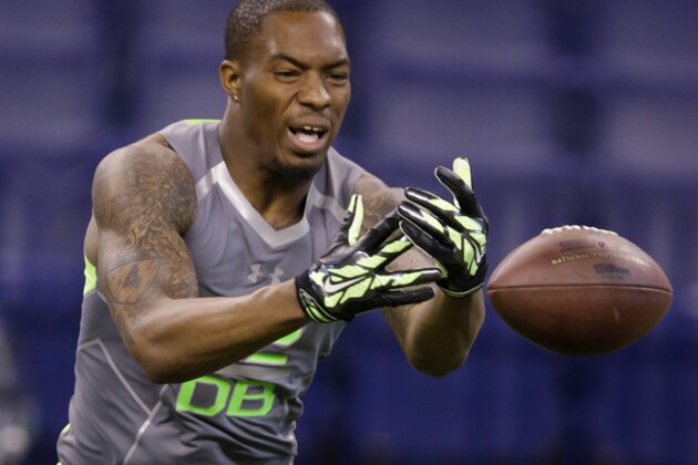 Alabama defensive back Ha Ha Clinton-Dix loses the ball as he runs a drill at the NFL football scouting combine in Indianapolis, Tuesday, Feb. 25, 2014. (AP Photo/Michael Conroy)