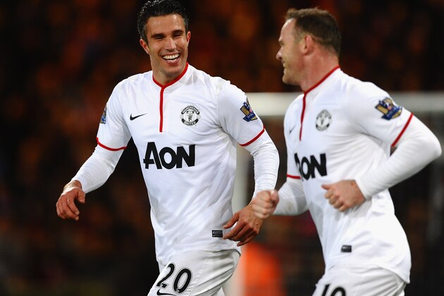 LONDON, ENGLAND - FEBRUARY 22:  Robin Van Persie of Manchester United celebrates the first goal with Wayne Rooney during the Barclays Premier League match between Crystal Palace and Manchester United at Selhurst Park on February 22, 2014 in London, England.  (Photo by Laurence Griffiths/Getty Images)