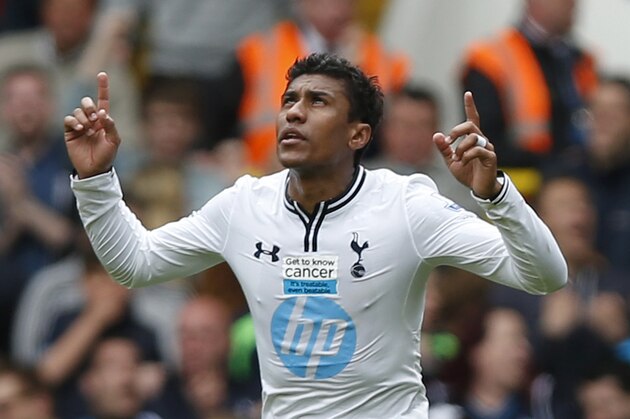Tottenham Hotspur's Paulinho celebrates his goal against Fulham during their English Premier League soccer match at White Hart Lane, London, Saturday, April 19, 2014. (AP Photo/Sang Tan)