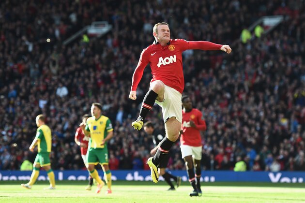 MANCHESTER, ENGLAND - APRIL 26: Wayne Rooney of Manchester United celebrates his first half penalty during the Barclays Premier League match between Manchester United and Norwich City at Old Trafford on April 26, 2014 in Manchester, England.  (Photo by Laurence Griffiths/Getty Images)