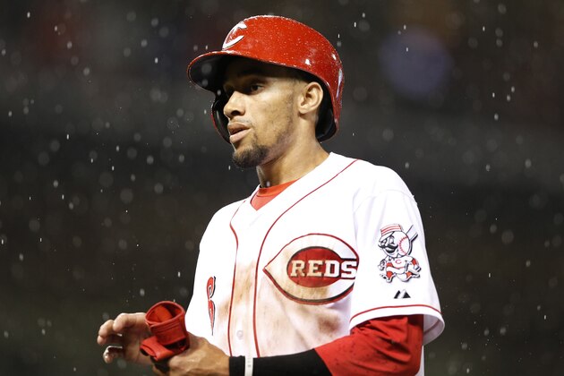 CINCINNATI, OH - APRIL 29: Billy Hamilton #6 of the Cincinnati Reds walks off the field as rain stops the game in the sixth inning against the Chicago Cubs at Great American Ball Park on April 29, 2014 in Cincinnati, Ohio. (Photo by Joe Robbins/Getty Images)