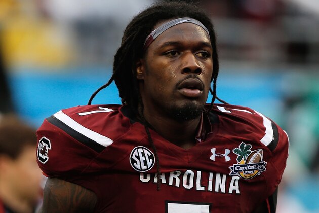 ORLANDO, FL - JANUARY 01:  Jadeveon Clowney #7 of the South Carolina Gamecocks walks off the field at the end of the first half of their game against the Wisconsin Badgers at the Capital One Bowl on January 1, 2014 in Orlando, Florida.  (Photo by Scott Halleran/Getty Images)