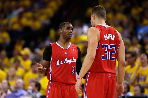 OAKLAND, CA - MAY 01:  Blake Griffin #32 talks to Chris Paul #3 of the Los Angeles Clippers during their game against the Golden State Warriors in Game Six of the Western Conference Quarterfinals during the 2014 NBA Playoffs at ORACLE Arena on May 1, 2014 in Oakland, California. NOTE TO USER: User expressly acknowledges and agrees that, by downloading and or using this photograph, User is consenting to the terms and conditions of the Getty Images License Agreement.  (Photo by Ezra Shaw/Getty Images)