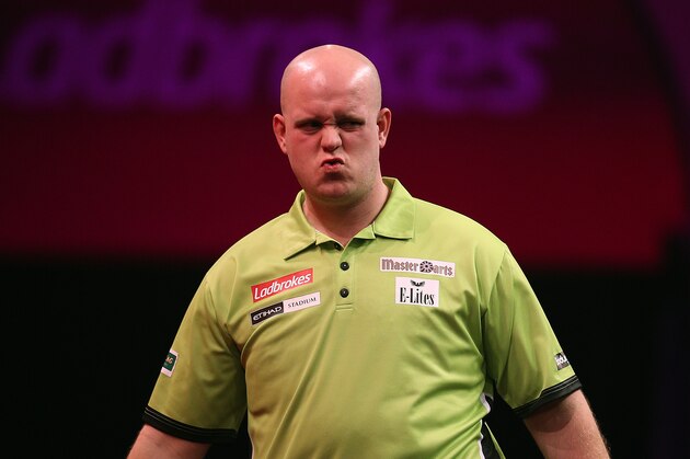 LONDON, ENGLAND - DECEMBER 22: Michael Van Gerwen of Holland reacts to going close to a 180 during his second round match against Kevin McDine of England during the Ladbrokes.com World Darts Championship on Day Ten at Alexandra Palace on December 22, 2013 in London, England. (Photo by Charlie Crowhurst/Getty Images)