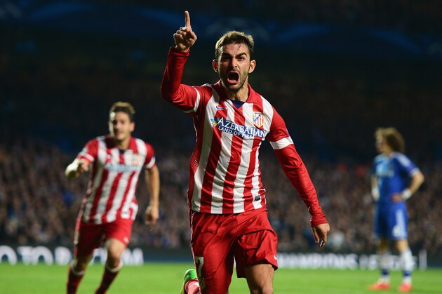 LONDON, ENGLAND - APRIL 30:  Adrian Lopez of Club Atletico de Madrid celebrates scoring his goal during the UEFA Champions League semi-final second leg match between Chelsea and Club Atletico de Madrid at Stamford Bridge on April 30, 2014 in London, England.  (Photo by Jamie McDonald/Getty Images)