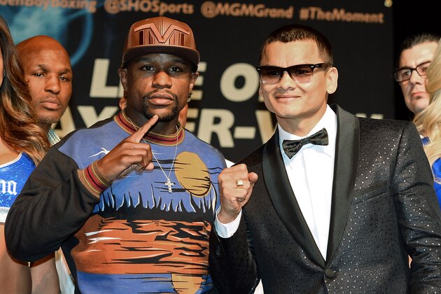 LAS VEGAS, NV - APRIL 30:  WBC welterweight champion Floyd Mayweather Jr. (L) and WBA champion Marcos Maidana pose during a news conference at the MGM Grand Hotel/Casino on April 30, 2014 in Las Vegas, Nevada. The two will meet in a WBC/WBA unification fight in Las Vegas on May 3.  (Photo by Ethan Miller/Getty Images)