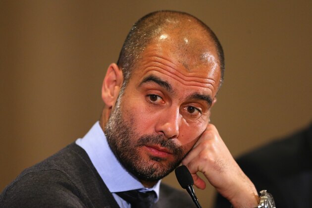 MANCHESTER, ENGLAND - MARCH 31:  Pep Guardiola the coach of FC Bayern Muenchen faces the media during a press conference at the Marriott Hotel on March 31, 2014 in Manchester, England.  (Photo by Alex Livesey/Getty Images)