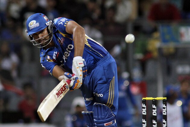 Mumbai Indians Rohit Sharma bats against Deccan Chargers during an Indian Premier League (IPL) cricket match  in Mumbai, India, Sunday, April 29, 2012 . (AP Photo/ Rajanish Kakade)