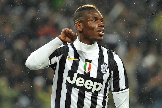 TURIN, ITALY - APRIL 19:  Paul Pogba of Juventus celebrates after scoring the opening goal during the Serie A match between Juventus and Bologna FC at Juventus Arena on April 19, 2014 in Turin, Italy.  (Photo by Valerio Pennicino/Getty Images)