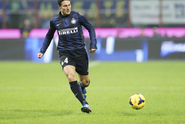 Inter Milan Argentine defender Javier Zanetti kicks the ball during the Serie A soccer match between Inter Milan and Livorno at the San Siro stadium in Milan, Italy, Saturday, Nov. 9, 2013. (AP Photo/Antonio Calanni) Inter Milan Argentine defender Javier Zanetti kicks the ball during the Serie A soccer match between Inter Milan and Livorno at the San Siro stadium in Milan, Italy, Saturday, Nov. 9, 2013. (AP Photo/Antonio Calanni)