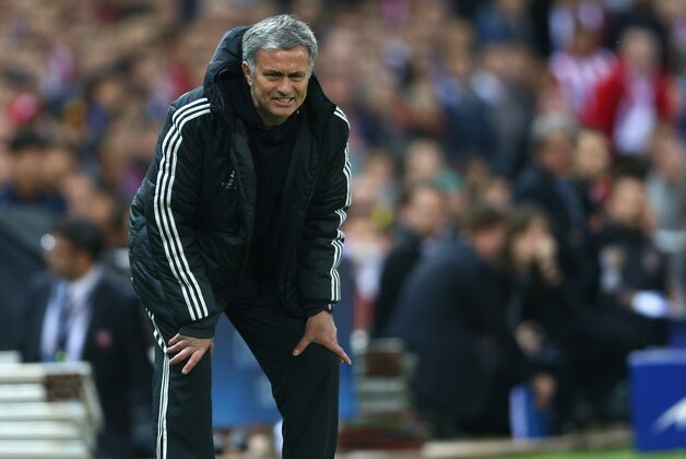MADRID, SPAIN - APRIL 22:  Manager Jose Mourinho of Chelsea looks on from the dug out during the UEFA Champions League Semi Final first leg match between Club Atletico de Madrid and Chelsea at Vicente Calderon Stadium on April 22, 2014 in Madrid, Spain.  (Photo by Paul Gilham/Getty Images)