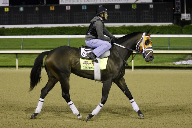 Exercise rider Joel Barrientos takes Kentucky Derby entrant General a Rod for a morning workout during a morning workout at Churchill Downs Friday, May 2, 2014, in Louisville, Ky. (AP Photo/Morry Gash)