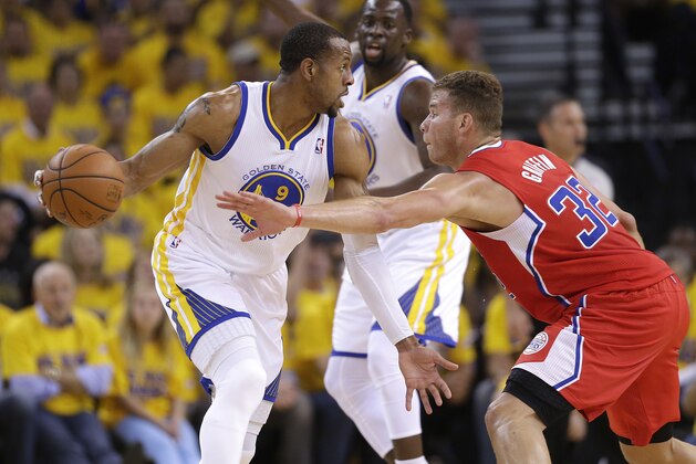 Golden State Warriors small forward Andre Iguodala (9) drives against Los Angeles Clippers forward Blake Griffin (32) during the first half of Game 6 of an opening-round NBA basketball playoff series in Oakland, Calif., Thursday, May 1, 2014. (AP Photo/Marcio Jose Sanchez)