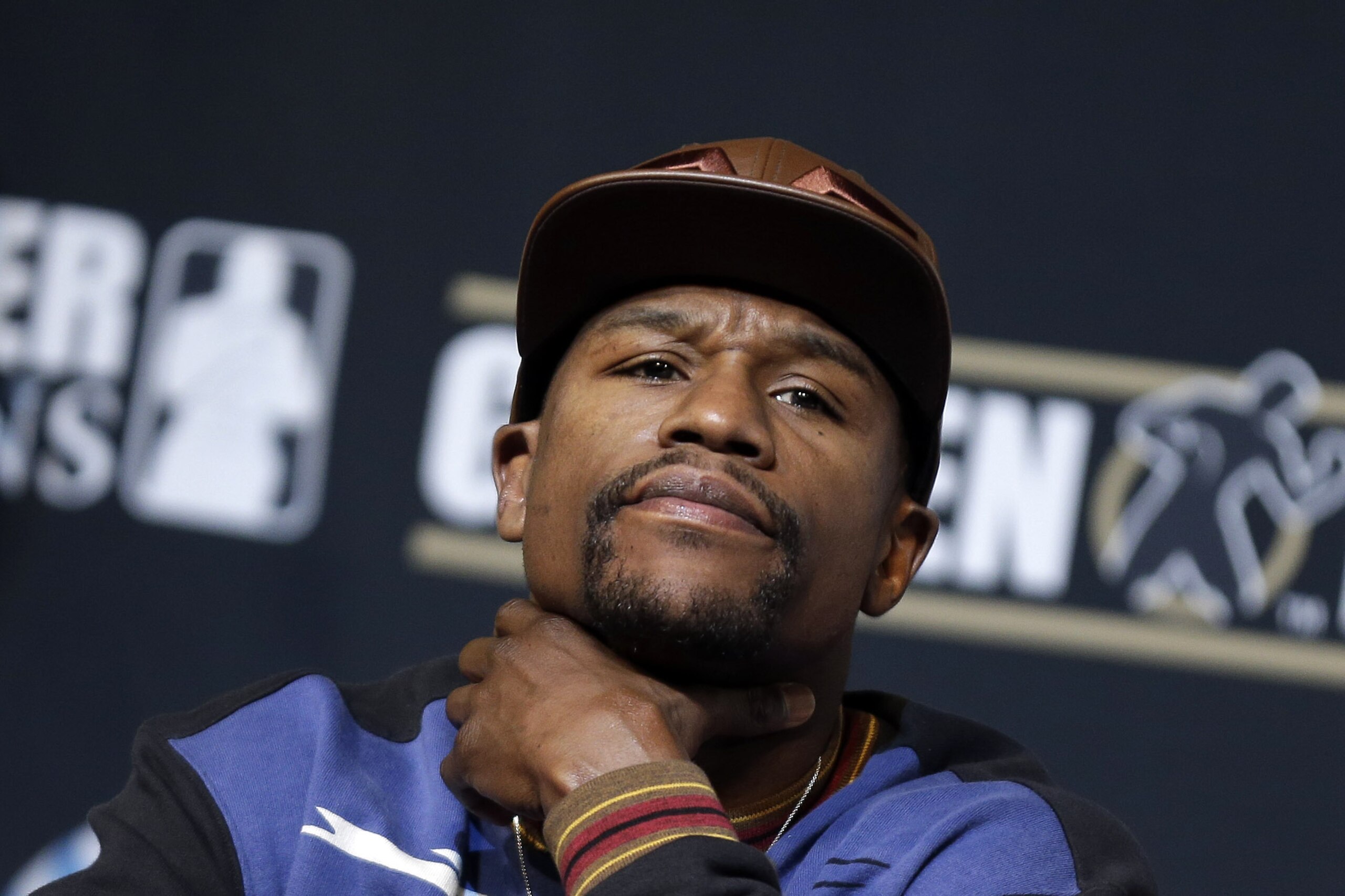 Boxer Floyd Mayweather Jr. listens during a news conference Wednesday, April 30, 2014, in Las Vegas. Mayweather will face Marcos Maidana in a welterweight title fight on Saturday, May 3.  (AP Photo/Isaac Brekken)
