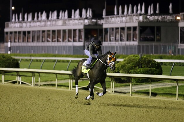 Exercise rider Joel Barrientos takes Kentucky Derby entrant General a Rod for a morning workout during a morning workout at Churchill Downs Friday, May 2, 2014, in Louisville, Ky. (AP Photo/Morry Gash)