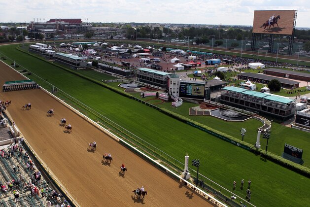 LOUISVILLE, KY - MAY 02:  Horses parade prior to the 3rd race ahead of the 140th Kentucky Oaks at Churchill Downs on May 2, 2014 in Louisville, Kentucky.  (Photo by Jamie Squire/Getty Images)