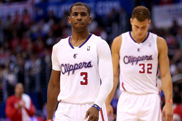 LOS ANGELES, CA - APRIL 29:  Chris Paul #3 and Blake Griffin #32 of the Los Angeles Clippers walk onto the floor after a time out against the Golden State Warriors in Game Five of the Western Conference Quarterfinals during the 2014 NBA Playoffs at Staples Center on April 29, 2014 in Los Angeles, California.  The Clippers won 113-103.   NOTE TO USER: User expressly acknowledges and agrees that, by downloading and or using this photograph, User is consenting to the terms and conditions of the Getty Images License Agreement.  (Photo by Stephen Dunn/Getty Images)