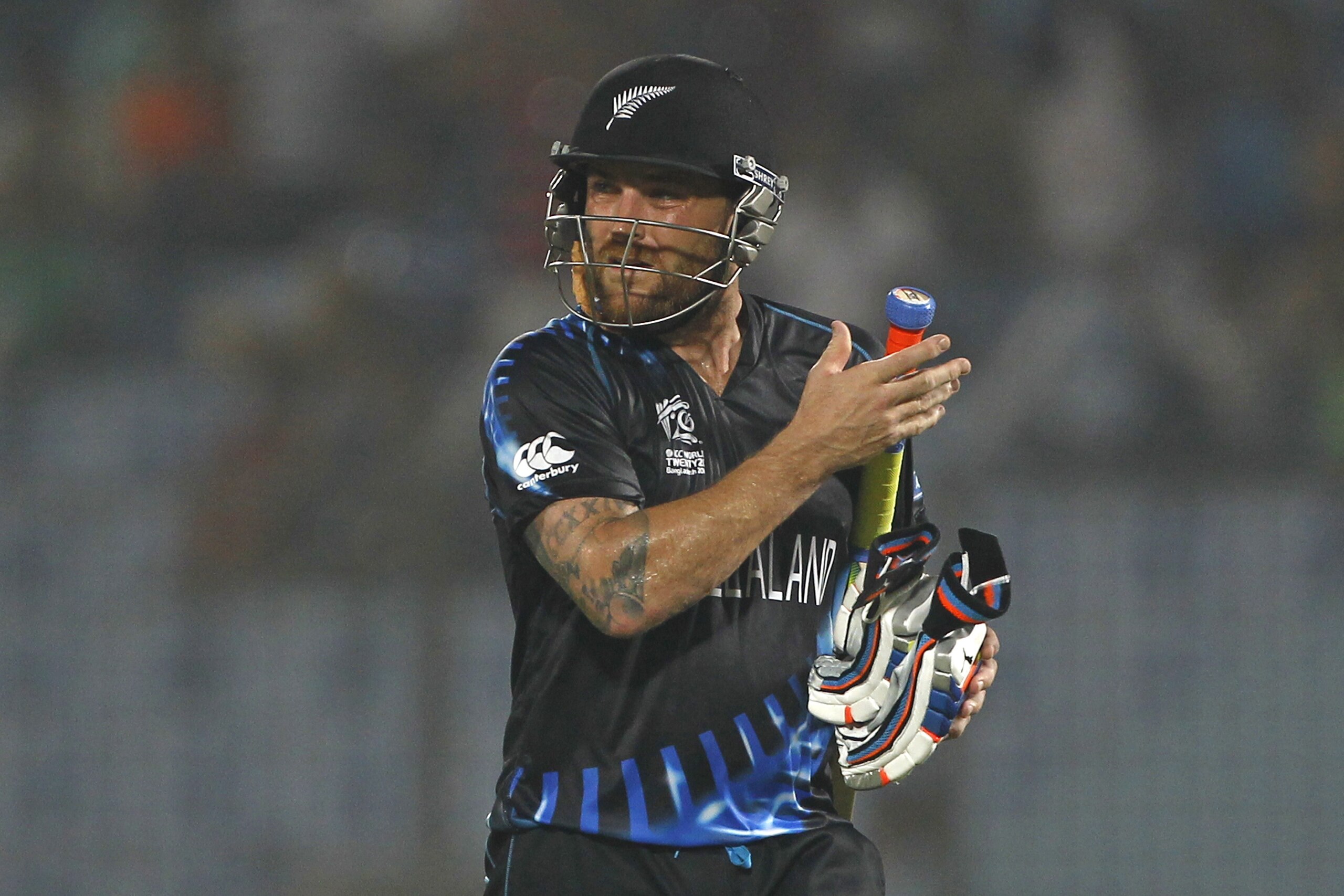 New Zealand's captain Brendon McCullum walks back to the pavilion after his dismissal by Netherlands's Timm van der Gugten during their ICC Twenty20 Cricket World Cup match in Chittagong, Bangladesh, Saturday, March 29, 2014. (AP Photo/A.M. Ahad)