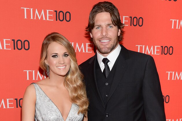 Singer Carrie Underwood and husband Mike Fisher arrive at the 2014 TIME 100 Gala held at Frederick P. Rose Hall, Jazz at Lincoln Center on Tuesday, April 29, 2014 in New York. (Photo by Evan Agostini/Invision/AP)