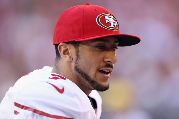 GLENDALE, AZ - DECEMBER 29:  Quarterback Colin Kaepernick #7 of the San Francisco 49ers during the NFL game against the Arizona Cardinals at the University of Phoenix Stadium on December 29, 2013 in Glendale, Arizona.  The 49ers defeated the Cardinals 23-20.  (Photo by Christian Petersen/Getty Images)