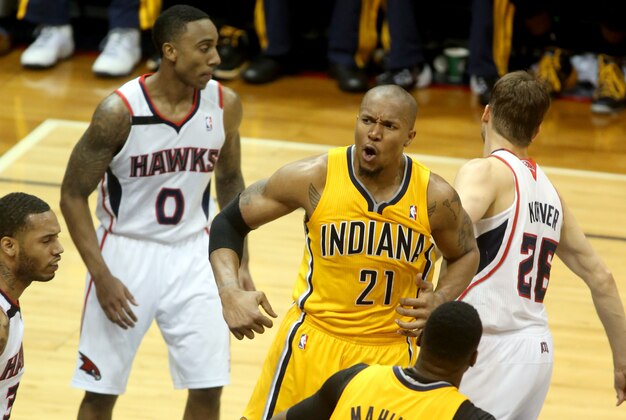 May 1, 2014; Atlanta, GA, USA; Indiana Pacers forward David West (21) reacts after making a basket against the Atlanta Hawks in the second half of game six of the first round of the 2014 NBA Playoffs at Philips Arena. The Indiana Pacers defeated the Atlanta Hawks 95-88. Mandatory Credit: Jason Getz-USA TODAY Sports