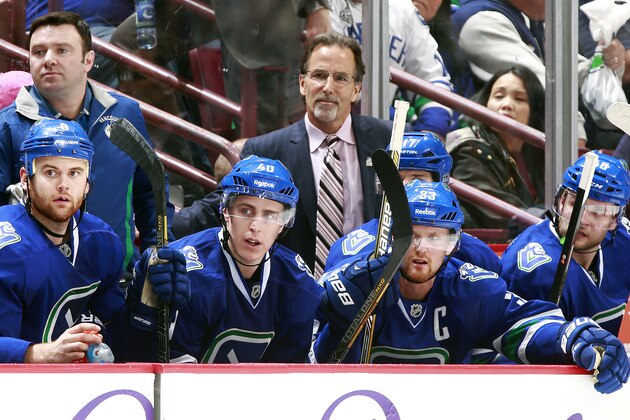 VANCOUVER, BC - APRIL 13:  Head coach John Tortorella of the Vancouver Canucks looks on from the bench during their NHL game against the Calgary Flames at Rogers Arena April 13, 2014 in Vancouver, British Columbia, Canada.  Vancouver won 5-1. (Photo by Jeff Vinnick/NHLI via Getty Images)