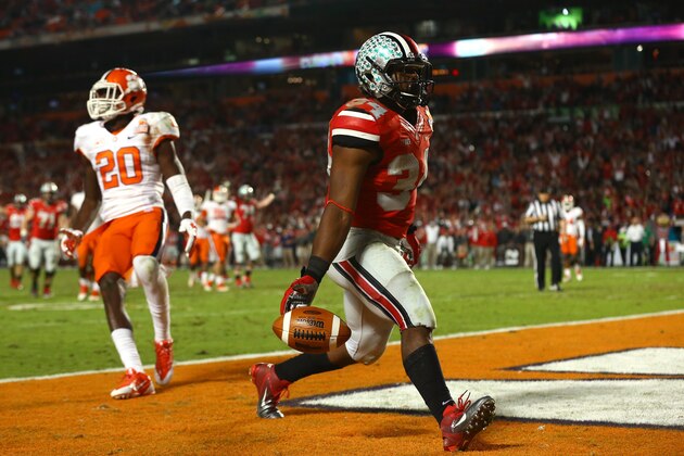 MIAMI GARDENS, FL - JANUARY 03: Carlos Hyde #34 of the Ohio State Buckeyes scores a touchdown in the fourth quarter against the Clemson Tigers during the Discover Orange Bowl at Sun Life Stadium on January 3, 2014 in Miami Gardens, Florida.  (Photo by Streeter Lecka/Getty Images)