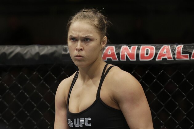 Ronda Rousey prepares for a UFC 170 mixed martial arts women's bantamweight title fight against Sara McMann on Saturday, Feb. 22, 2014, in Las Vegas. (AP Photo/Isaac Brekken)