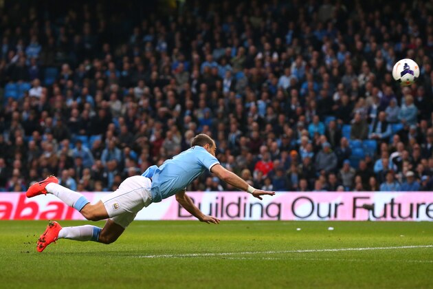 MANCHESTER, ENGLAND - APRIL 21:  Pablo Zabaleta of Manchester City scores the opening goal during the Barclays Premier League match between Manchester City and West Bromwich Albion at Etihad Stadium on April 21, 2014 in Manchester, England.  (Photo by Alex Livesey/Getty Images)