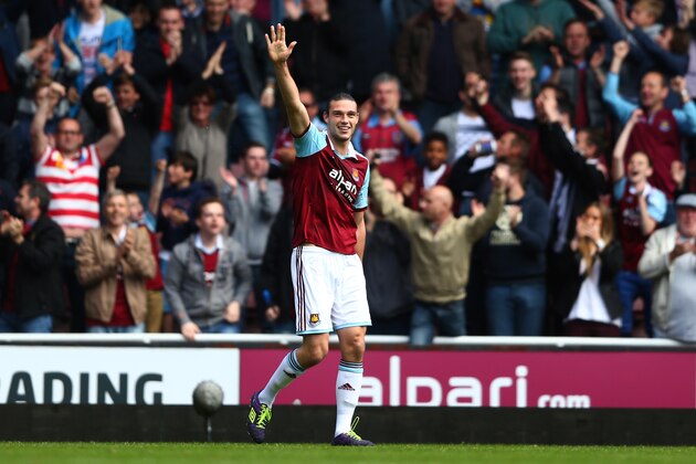 LONDON, ENGLAND - MAY 03:  Andy Carroll of West Ham celebrates after his team take a 1-0  lead following an own goal by Harry Kane of Spurs during the Barclays Premier League match between West Ham United and Tottenham Hotspur at Boleyn Ground on May 3, 2014 in London, England.  (Photo by Paul Gilham/Getty Images)