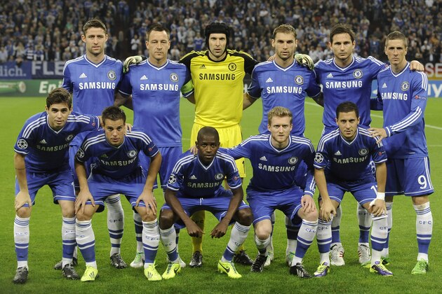 Chelsea players line up for a team photo prior to the Champions League group E soccer match between FC Schalke 04 and Chelsea FC in Gelsenkirchen       , Germany, Tuesday, Oct.22,2013. (AP Photo/Martin Meissner)