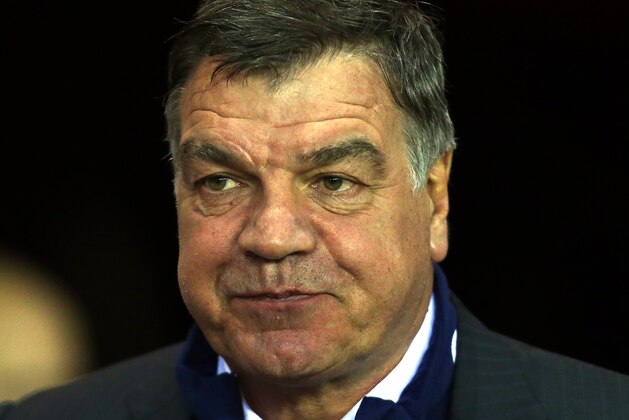 West Ham United's manager Sam Allardyce pauses, ahead of his team's English Premier League soccer match against Sunderland at the Stadium of Light, Sunderland, England, Monday, March 31, 2014. (AP Photo/Scott Heppell)