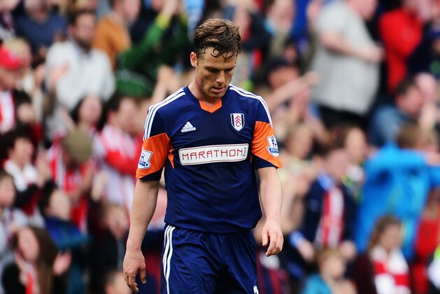 STOKE ON TRENT, ENGLAND - MAY 03:  Scott Parker of Fulham reacts as his side concedes a third goal during the Barclays Premier League match between Stoke City and Fulham at the Britannia Stadium on May 3, 2014 in Stoke on Trent, England.  (Photo by Jamie McDonald/Getty Images)