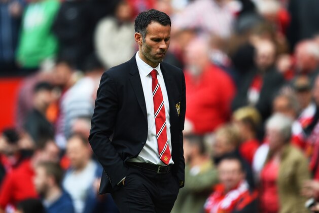 MANCHESTER, ENGLAND - MAY 03:  A dejected Ryan Giggs the Manchester United interim manager walks off the pitch following his team's 1-0 defeat during the Barclays Premier League match between Manchester United and Sunderland at Old Trafford on May 3, 2014 in Manchester, England.  (Photo by Shaun Botterill/Getty Images)