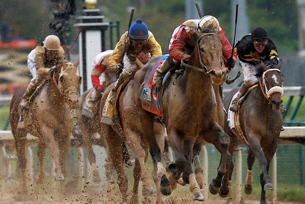 LOUISVILLE, KY - MAY 04:  Jockey Joel Rosario guides Orb to the finish line to win the 139th running of the Kentucky Derby at Churchill Downs on May 4, 2013 in Louisville, Kentucky.  (Photo by Rob Carr/Getty Images)