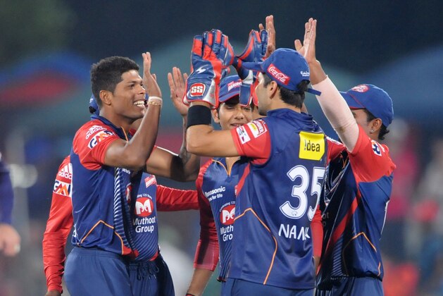 PRETORIA, SOUTH AFRCA - OCTOBER 13:  Umesh Yadav (L) of the Daredevils celebrateswith team-mates after capturing the wicket of Yusuf Pathan (not pictured) of the Knight Riders during the Karbonn Smart CLT20 match between Kolkata Knight Riders (IPL) and Delhi Daredevils (IPL) at SuperSport Park on October 13, 2012 in Pretoria, South Africa.  (Photo by Lee Warren/Gallo Images/Getty Images)