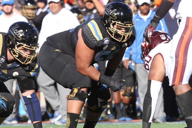 UCLA guard Xavier Su'a-Filo is seen against Virginia Tech during the Sun Bowl NCAA college football game Tuesday Dec. 31, 2013. (AP Photo/Victor Calzada)