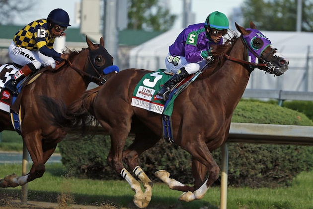 Victor Espinoza rides California Chrome to a victory during the 140th running of the Kentucky Derby horse race at Churchill Downs Saturday, May 3, 2014, in Louisville, Ky. (AP Photo/Matt Slocum)
