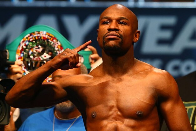 May 2, 2014; Las Vegas, NV, USA; Floyd Mayweather gestures during weigh ins prior to his fight against Marcos Maidana at MGM Grand Garden Arena. Mandatory Credit: Mark J. Rebilas-USA TODAY Sports
