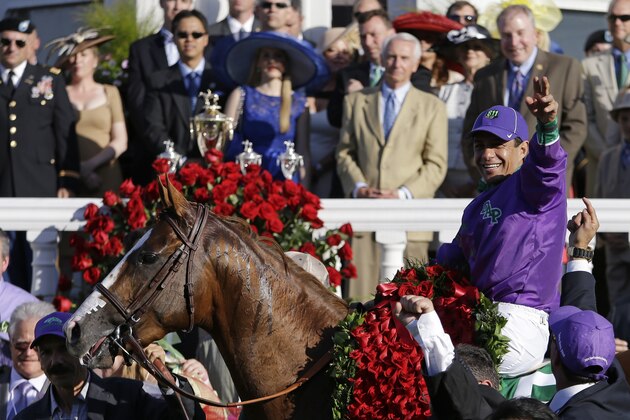 Victor Espinoza celebrates after riding California Chrome to victory in the 140th running of the Kentucky Derby horse race at Churchill Downs Saturday, May 3, 2014, in Louisville, Ky. (AP Photo/David Goldman) Victor Espinoza celebrates after riding California Chrome to victory in the 140th running of the Kentucky Derby horse race at Churchill Downs Saturday, May 3, 2014, in Louisville, Ky. (AP Photo/David Goldman)
