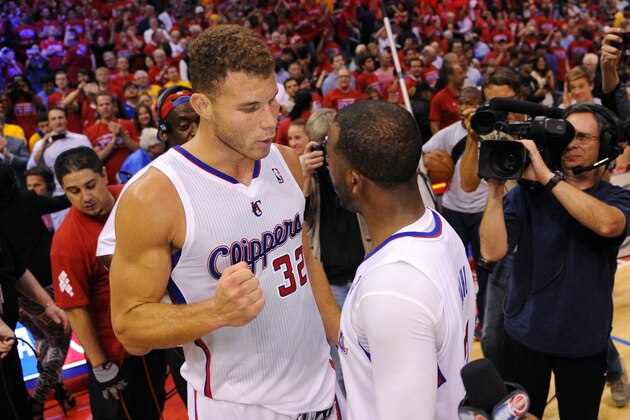 Los Angeles Clippers forward Blake Griffin, left, congratulates guard Chris Paul after defeating the Golden State Warriors in Game 7 of an opening-round NBA basketball playoff series, Saturday, May 3, 2014, in Los Angeles. The Clippers won 126-121. (AP Photo/Mark J. Terrill)
