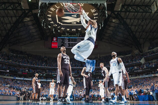 DALLAS, TX - MAY 2:  Shawn Marion #0 of the Dallas Mavericks dunks against Boris Diaw #33 of the San Antonio Spurs during Game Six of the Western Conference Quarterfinals during the 2014 NBA Playoffs on May 2, 2014 at the American Airlines Center in Dallas, Texas. NOTE TO USER: User expressly acknowledges and agrees that, by downloading and/or using this Photograph, user is consenting to the terms and conditions of the Getty Images License Agreement. Mandatory Copyright Notice: Copyright 2014 NBAE (Photo by Glenn James/NBAE via Getty Images)
