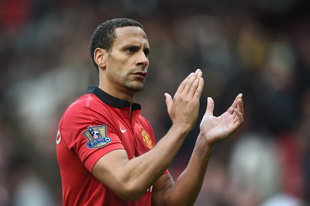 MANCHESTER, ENGLAND - APRIL 26: Rio Ferdinand of Manchester United applauds the fans after the Barclays Premier League match between Manchester United and Norwich City at Old Trafford on April 26, 2014 in Manchester, England.  (Photo by Laurence Griffiths/Getty Images)