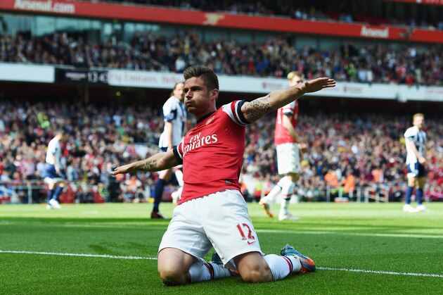 LONDON, ENGLAND - MAY 04:  Olivier Giroud of Arsenal after scoring during the Barclays Premier League match between Arsenal and West Bromwich Albion at the Emirates Stadium on May 4, 2014 in London, England.  (Photo by Shaun Botterill/Getty Images)