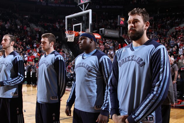 PORTLAND, OR - MARCH 30:  Marc Gasol #33 and Zach Randolph #50 of the Memphis Grizzlies stand on the court before the game against the Portland Trail Blazers on March 30, 2014 at the Moda Center Arena in Portland, Oregon. NOTE TO USER: User expressly acknowledges and agrees that, by downloading and or using this photograph, user is consenting to the terms and conditions of the Getty Images License Agreement. Mandatory Copyright Notice: Copyright 2014 NBAE (Photo by Sam Forencich/NBAE via Getty Images)