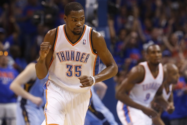 Oklahoma City Thunder forward Kevin Durant (35) pumps his fist as he heads back up the court following a three point basket in the second quarter of Game 7 of an opening-round NBA basketball playoff series against the Memphis Grizzlies in Oklahoma City, Saturday, May 3, 2014. (AP Photo/Sue Ogrocki)