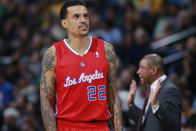 Los Angeles Clippers forward Matt Barnes looks on against the Denver Nuggets in the third quarter of the Nuggets' 110-100 victory in an NBA basketball game in Denver on Monday, March 17, 2014. (AP Photo/David Zalubowski)