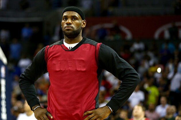 CHARLOTTE, NC - APRIL 28:  LeBron James #6 of the Miami Heat wears a black head band and inside out warm up jersey before his game against the Charlotte Bobcats in Game Four of the Eastern Conference Quarterfinals during the 2014 NBA Playoffs at Time Warner Cable Arena on April 28, 2014 in Charlotte, North Carolina.  NOTE TO USER: User expressly acknowledges and agrees that, by downloading and or using this photograph, User is consenting to the terms and conditions of the Getty Images License Agreement.  (Photo by Streeter Lecka/Getty Images)